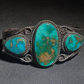Lot 027 - Vintage Old Pawn Native American Sterling Silver and Turquoise Three-Stone Cuff Bracelet with Stampwork and Twisted Wire Accents, Total Weight 40.63 g