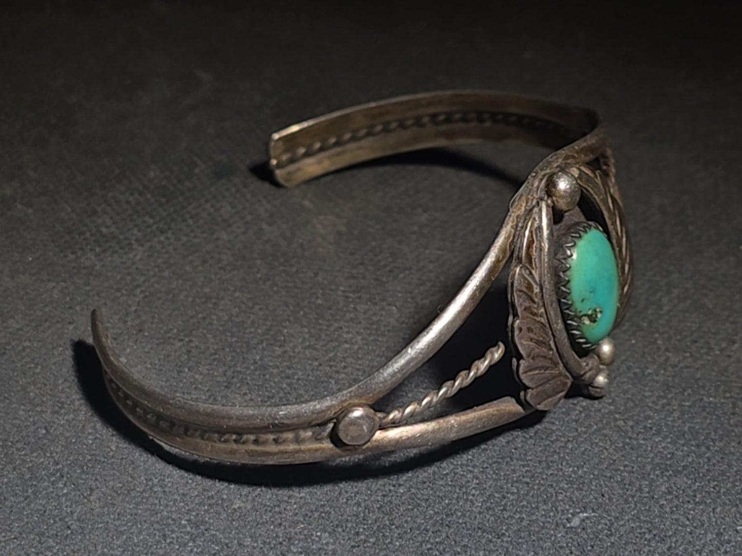 Vintage Native American Sterling Silver and Turquoise Cuff Bracelet with Feather Motif, Stamped "D"