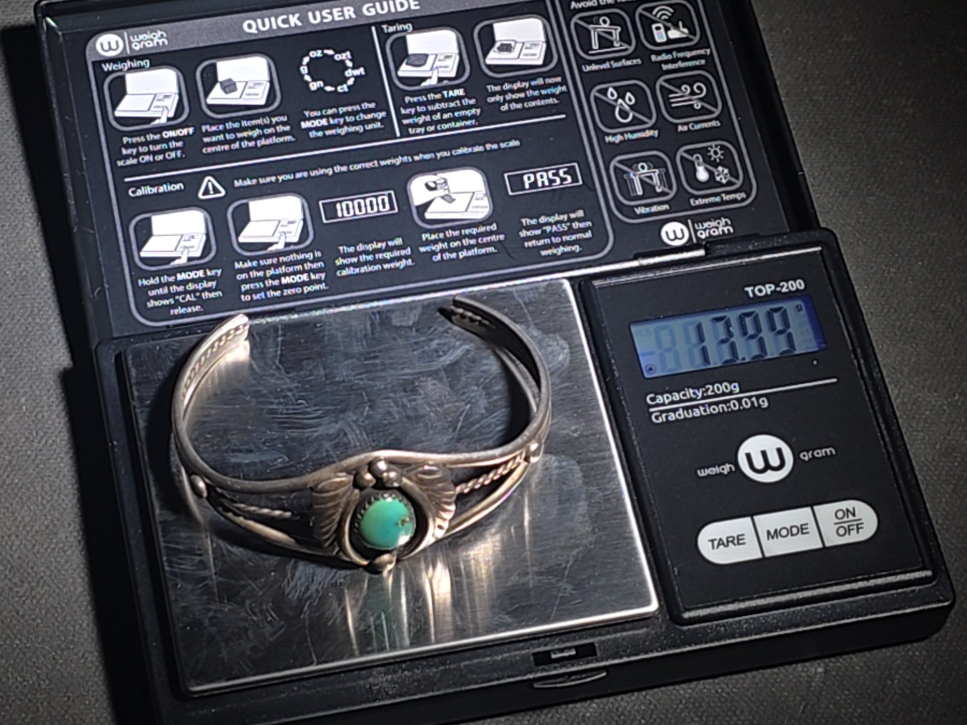 Vintage Native American Sterling Silver and Turquoise Cuff Bracelet with Feather Motif, Stamped "D"