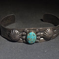 Lot 029 - Vintage Native American Sterling Silver and Turquoise Cuff Bracelet with Stampwork and Applied Rosette Accents, Total Weight 25.57 g