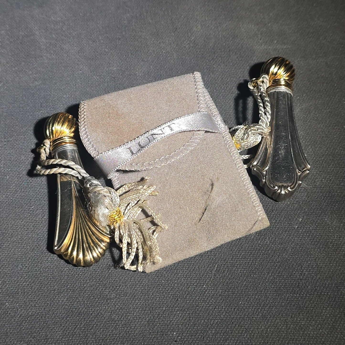 Pair of Vintage Lunt Sterling Silver Perfume Flasks with Gold-Tone Caps and Tassels in Two Patterns with Lunt Storage Pouch