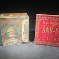 Lot 048 - Pair of Antique Wooden Cigar Boxes Including LA Magnita Puritanos Finos by the Waldorf-Astoria Segar Co. and H.O. Walker's Say-So Cigar