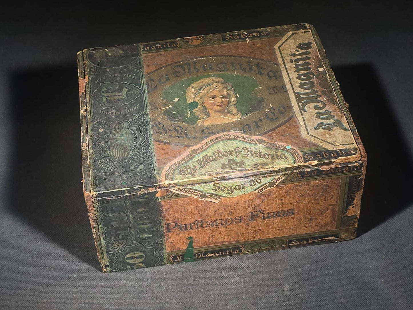 Pair of Antique Wooden Cigar Boxes including La Magnita Puritanos Finos by The Waldorf-Astoria Segar Co. and H.O. Walker's Say-So Cigar
