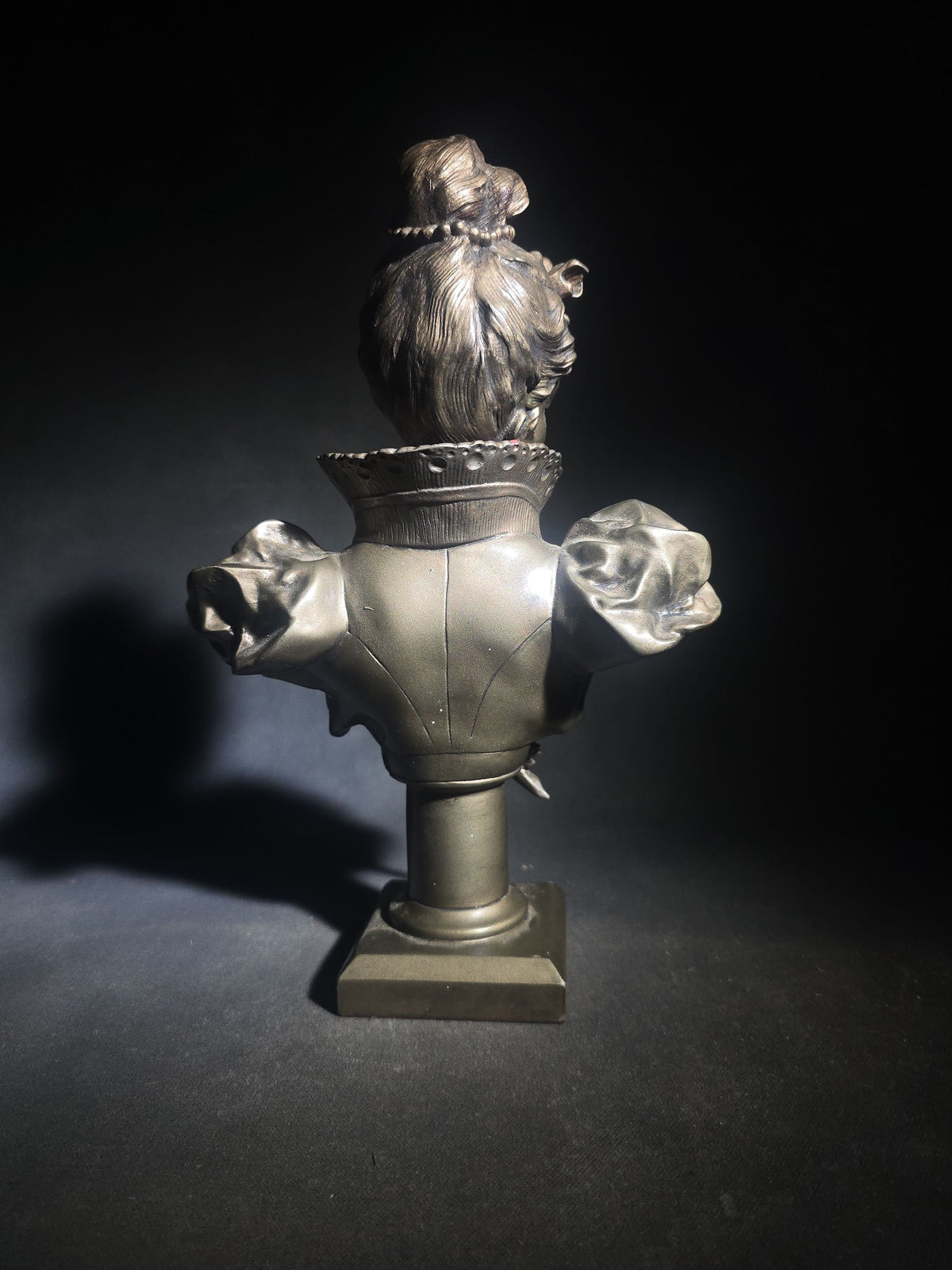 Vintage Art Nouveau Style Bust of a Young Woman with Upswept Hair, Ruffled Collar, and Rose Spray on Pedestal Base