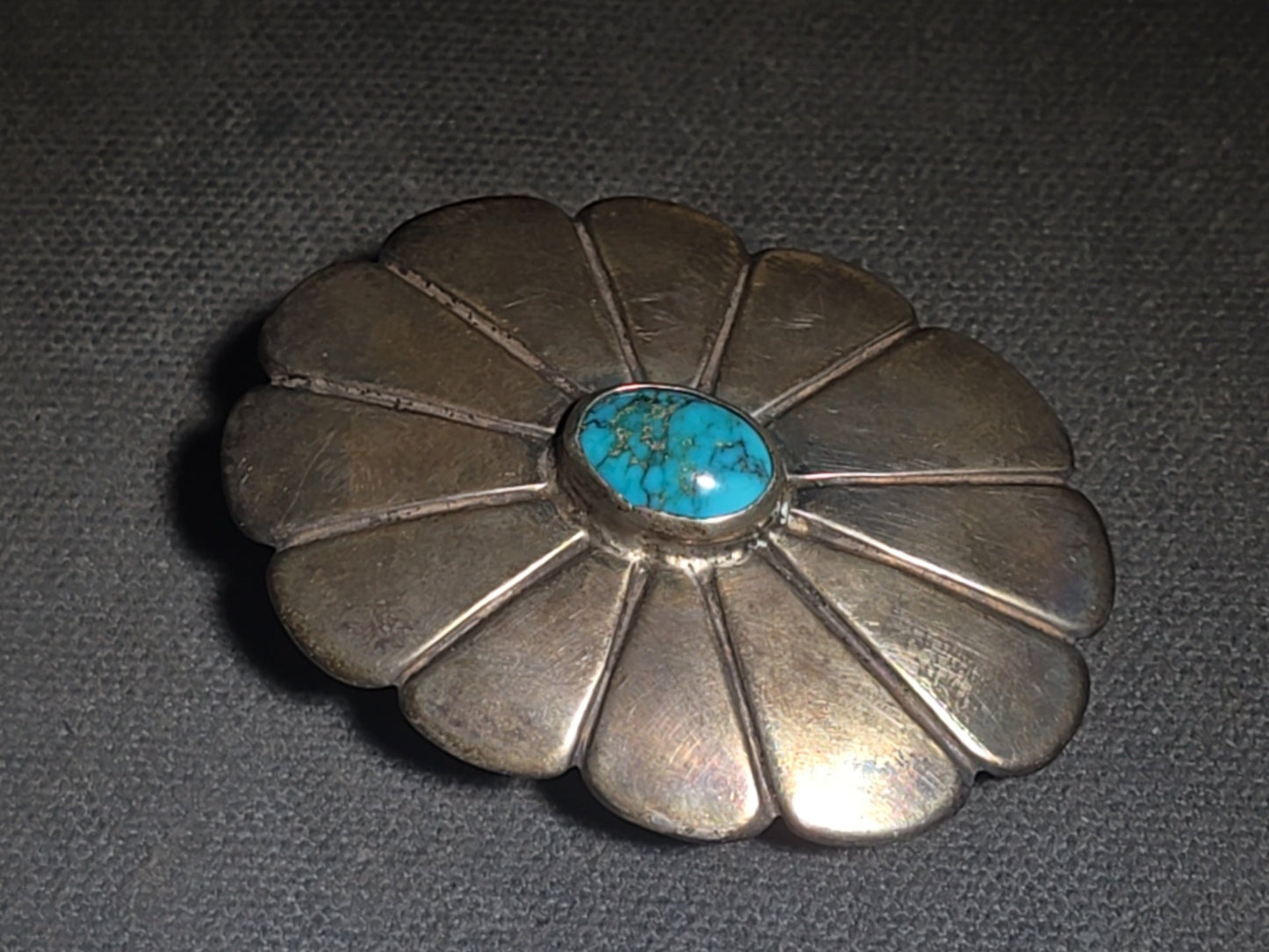Pair of Vintage Southwestern Sterling Silver Belt Buckles including Turquoise-Set Petal Form and Stamped Oval Concho