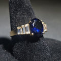 Lot 020 - 14k Gold Sapphire Ring with Cubic Zirconia Accent Stones, Size 8, Total Weight 3.42 g