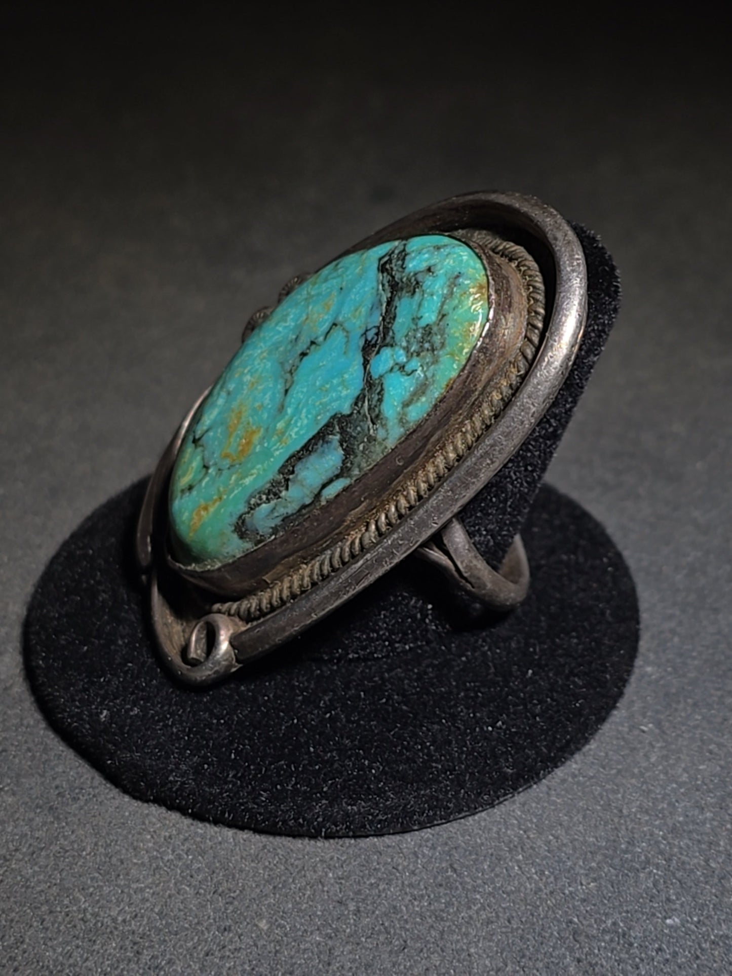 Vintage Old Pawn Native American Sterling Silver and Turquoise Ring with Rope Bezel and Scroll Accents