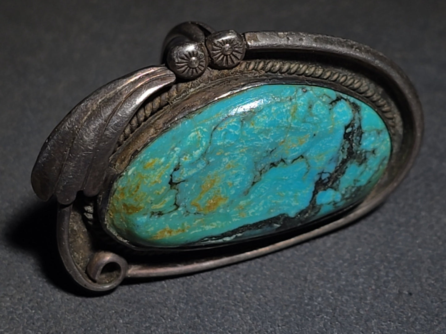 Vintage Old Pawn Native American Sterling Silver and Turquoise Ring with Rope Bezel and Scroll Accents