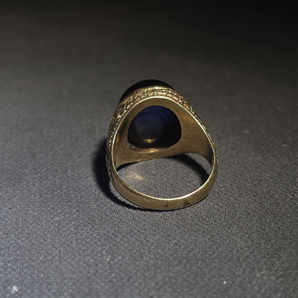 14K Gold Ring with Large Oval Cabochon Sapphire and Engraved Floral Scrollwork Band