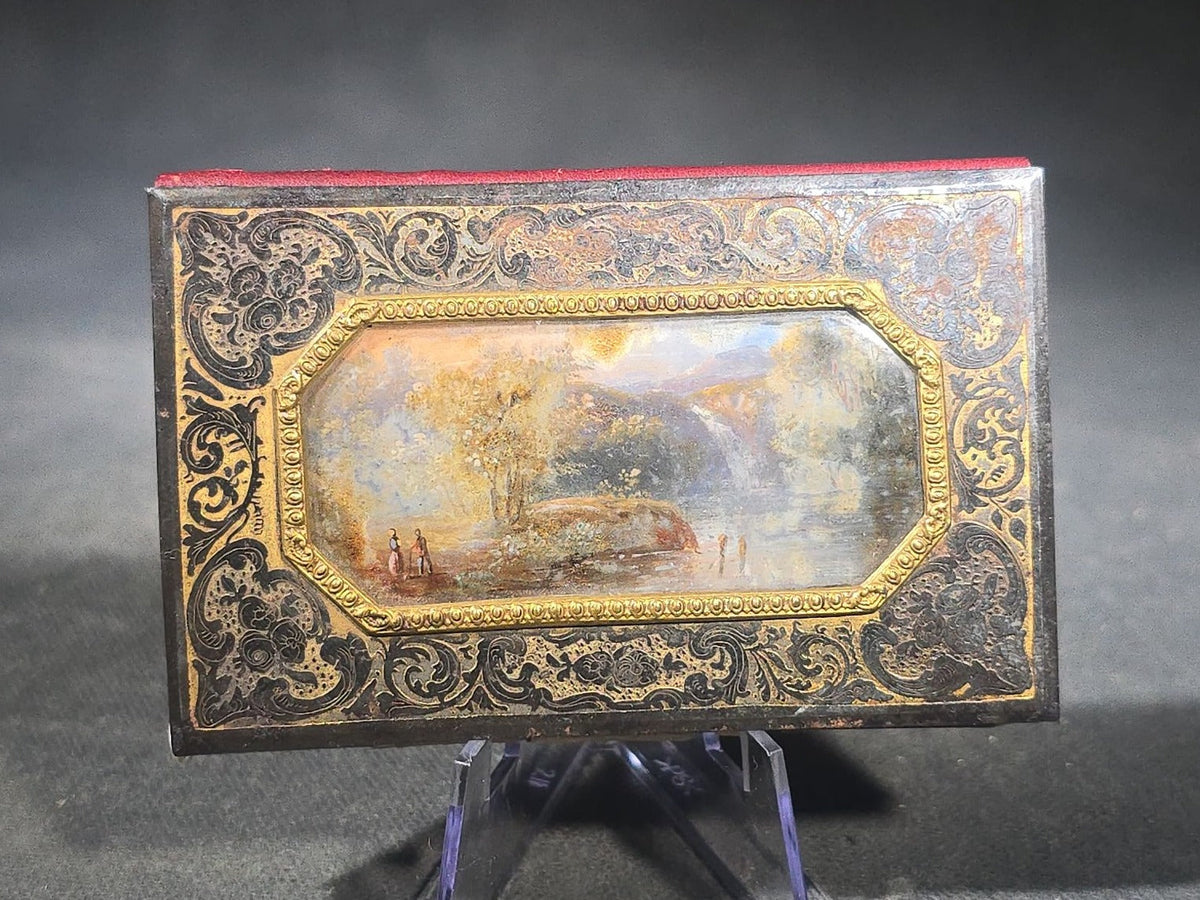 Antique Etched Metal Aide-Memoire Pocket Notebook with Hand-Painted Landscape Scene, Gold Scroll Decoration, and Figural Back Cover with Pencil