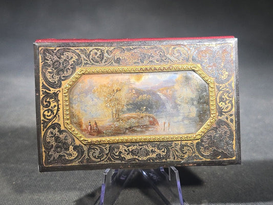 Antique Etched Metal Aide-Memoire Pocket Notebook with Hand-Painted Landscape Scene, Gold Scroll Decoration, and Figural Back Cover with Pencil