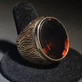 Lot 023 - 10k Gold Ring with Large Oval Buff-Top Amber-Colored Stone and Textured Band, Size 10.5, Total Weight 24.38 g