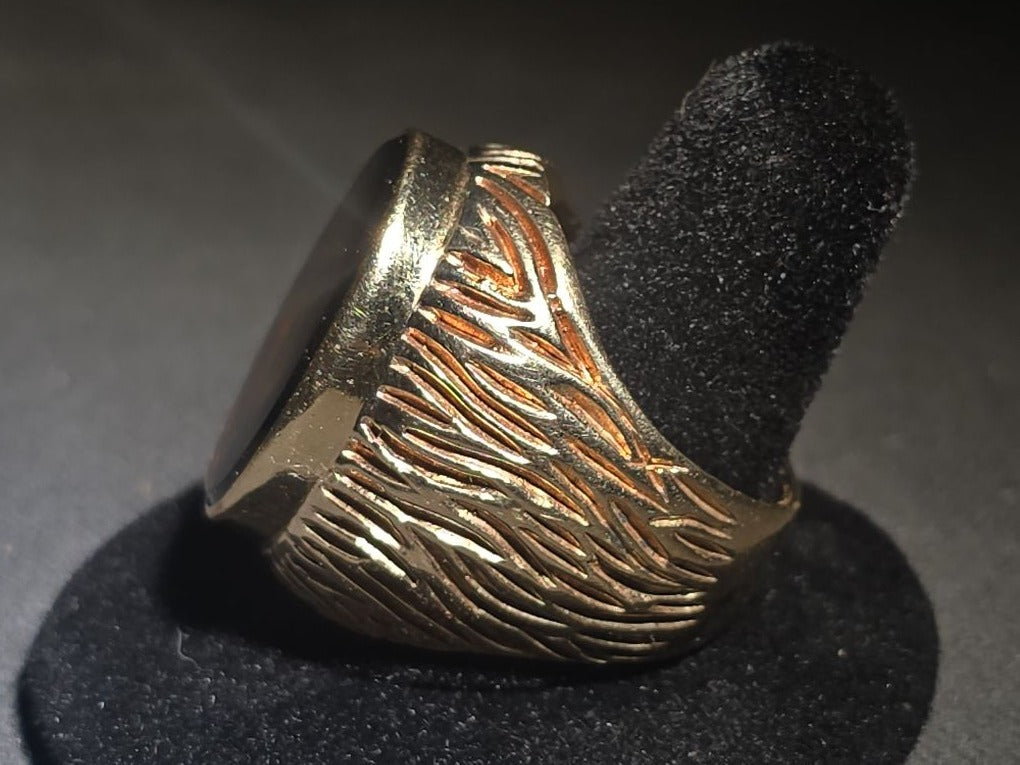 10K Gold Ring with Large Oval Buff-Top Amber-Colored Stone and Textured Band