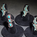 Lot 038 - Grouping of Four Vintage Southwestern Sterling Silver and Turquoise Rings Including Three Matching Petit Point Leaf Rings and a Three-Stone Oval Cabochon Ring, Total Weight 11.17 g