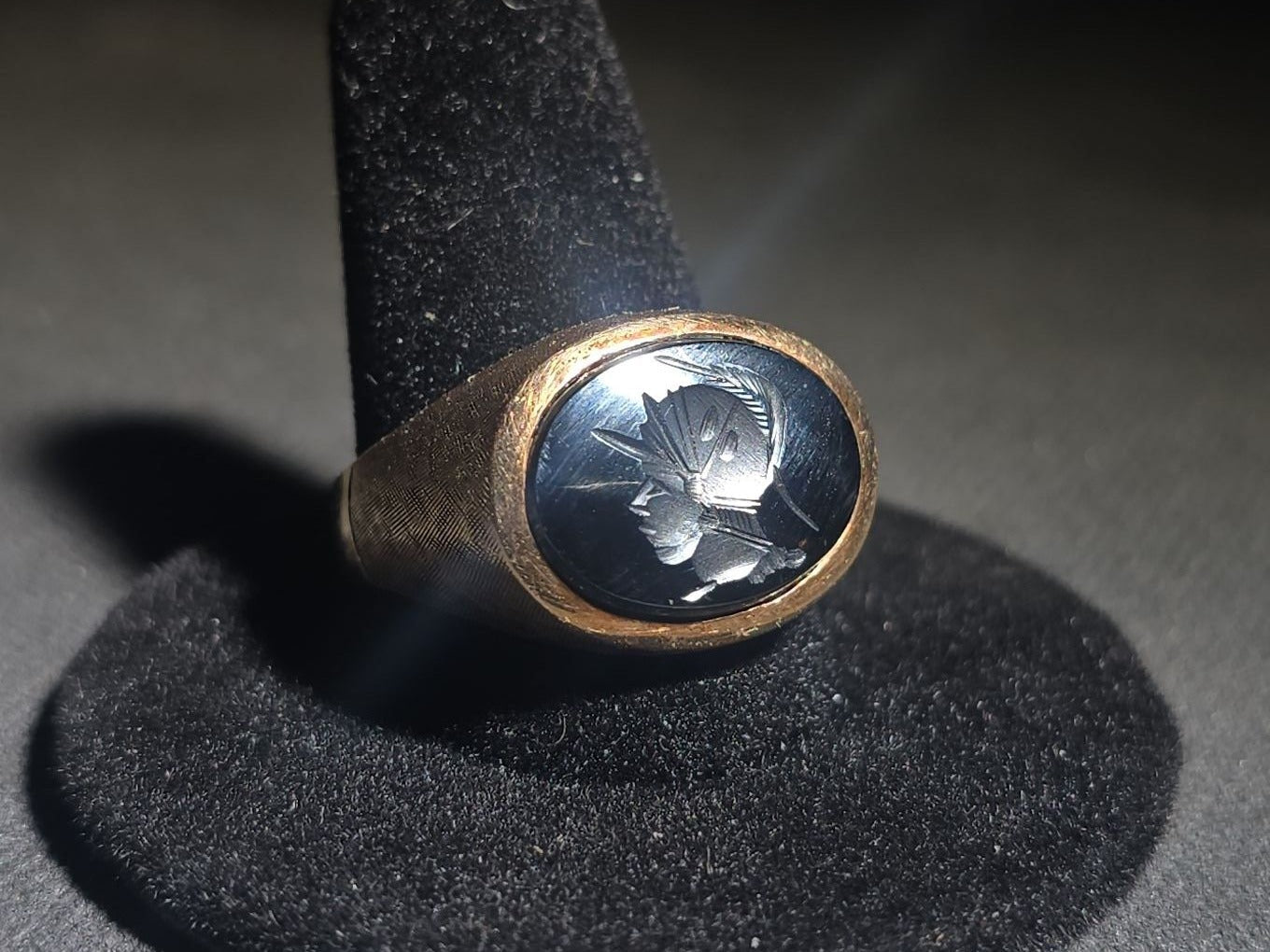 10K Gold Ring with Oval Intaglio-Carved Dark Stone Depicting a Roman Warrior in Plumed Helmet and Crosshatch Textured Band