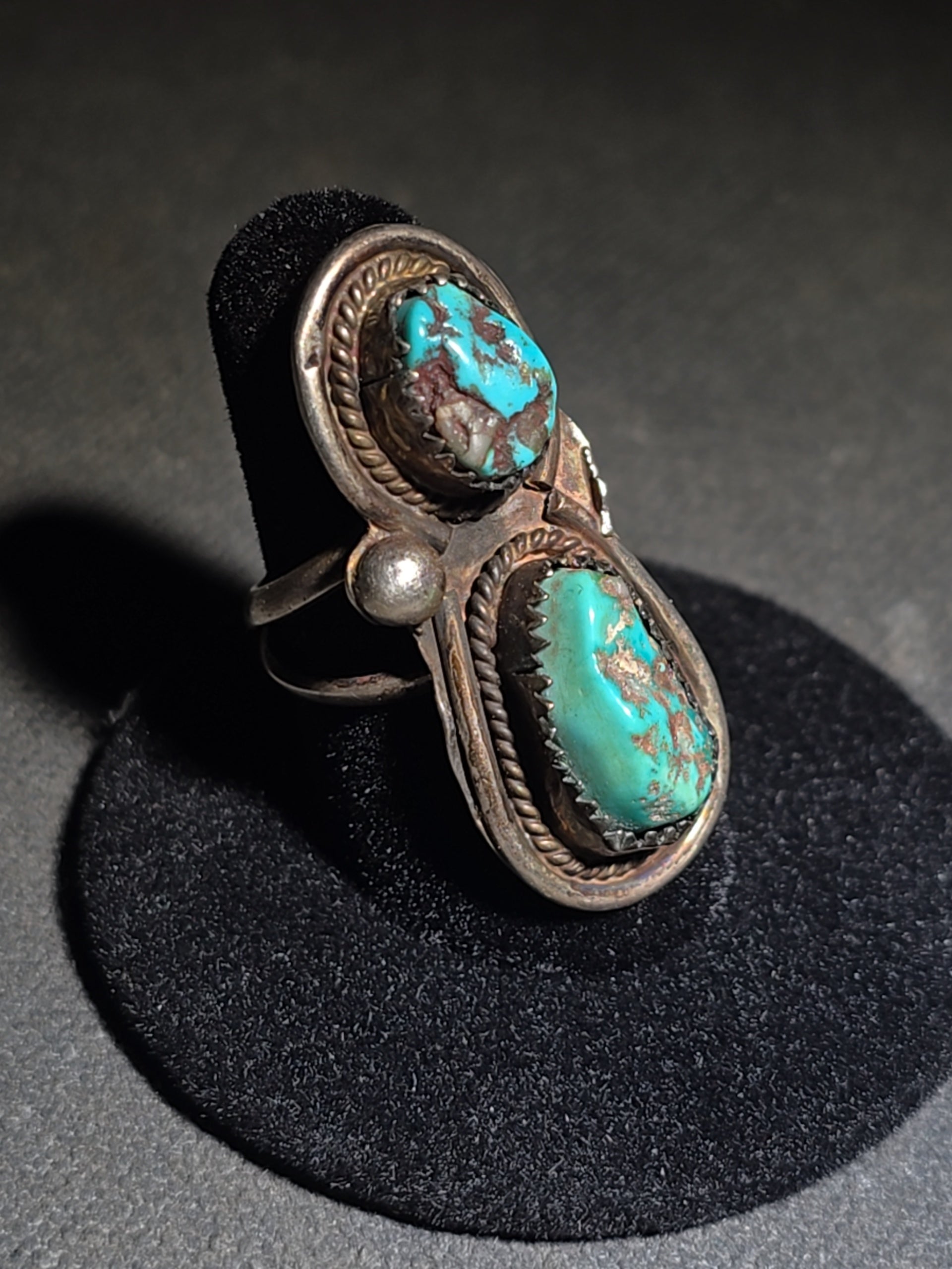 Vintage Old Pawn Native American Sterling Silver and Turquoise Two-Stone Ring with Sawtooth Bezels and Rope Wire Accents