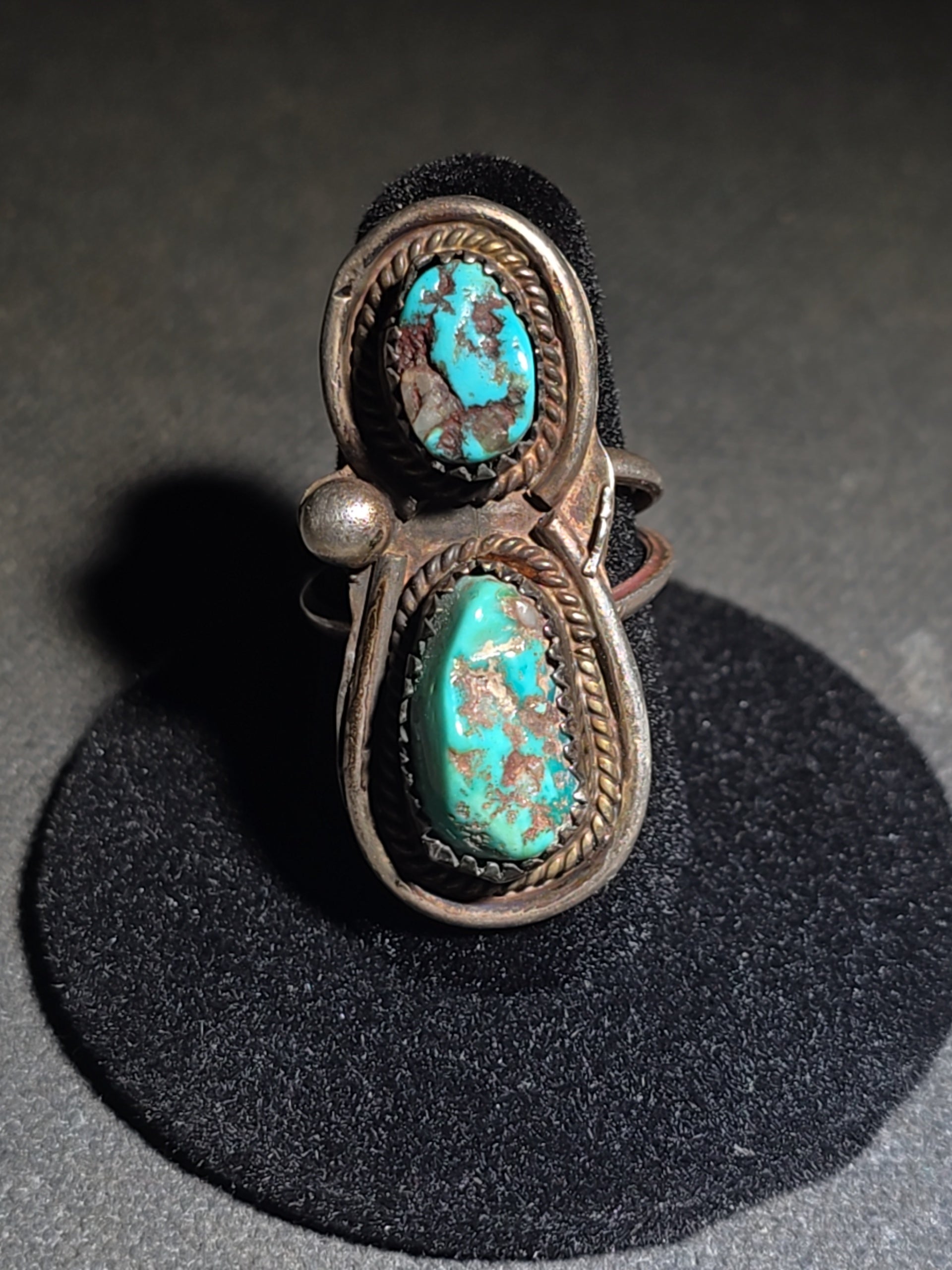 Vintage Old Pawn Native American Sterling Silver and Turquoise Two-Stone Ring with Sawtooth Bezels and Rope Wire Accents