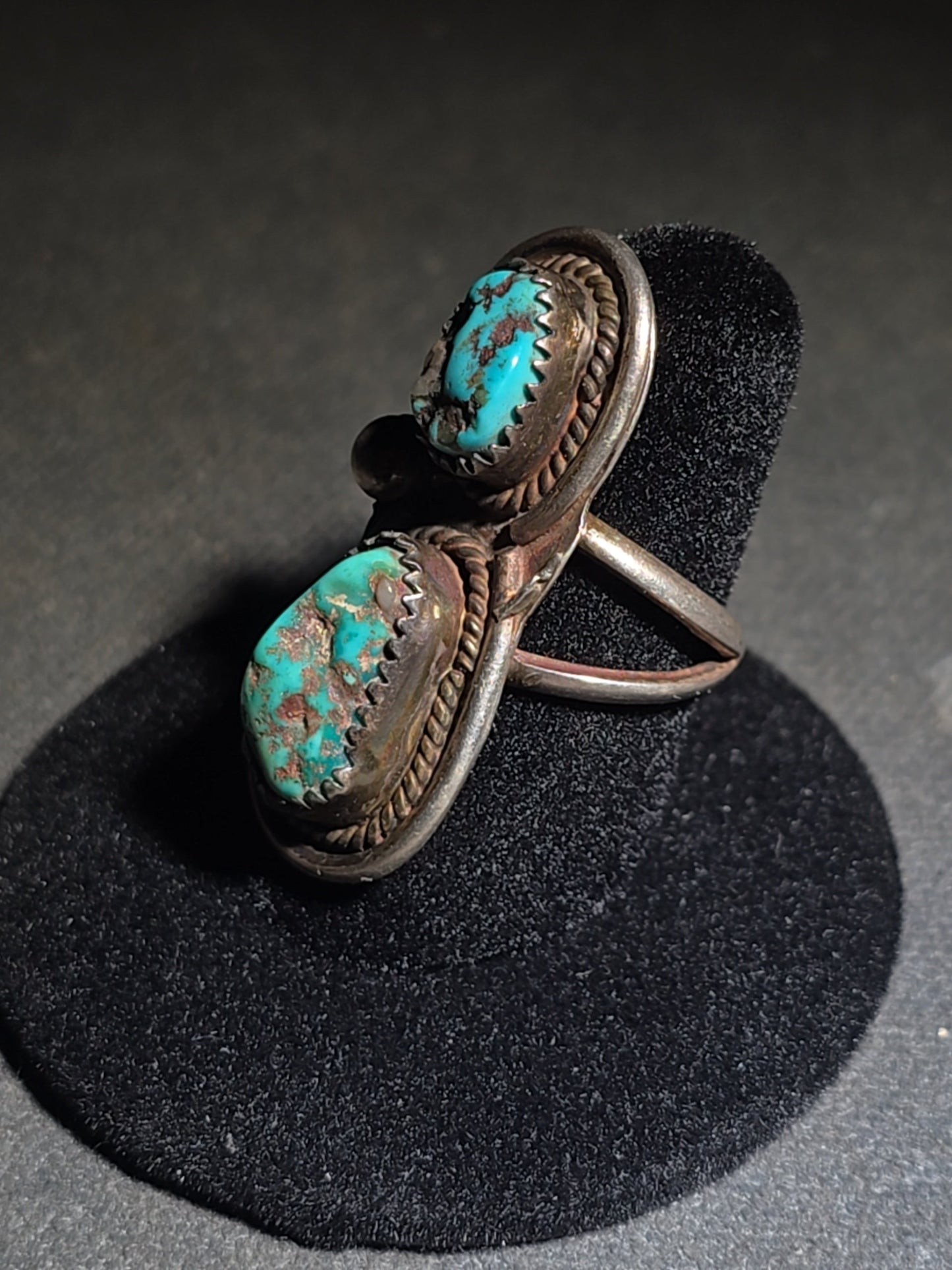 Vintage Old Pawn Native American Sterling Silver and Turquoise Two-Stone Ring with Sawtooth Bezels and Rope Wire Accents