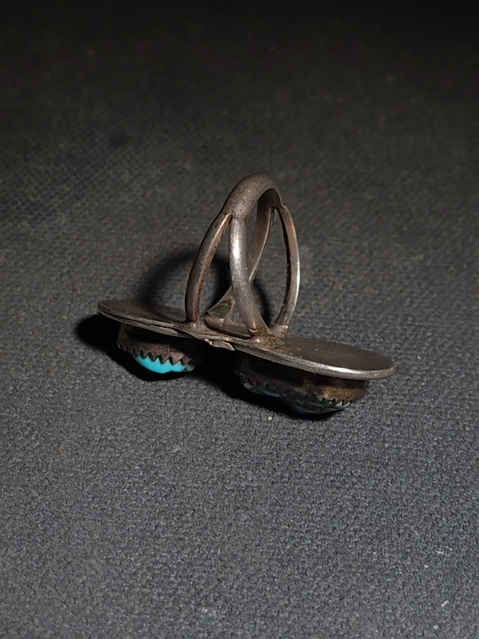 Vintage Old Pawn Native American Sterling Silver and Turquoise Two-Stone Ring with Sawtooth Bezels and Rope Wire Accents