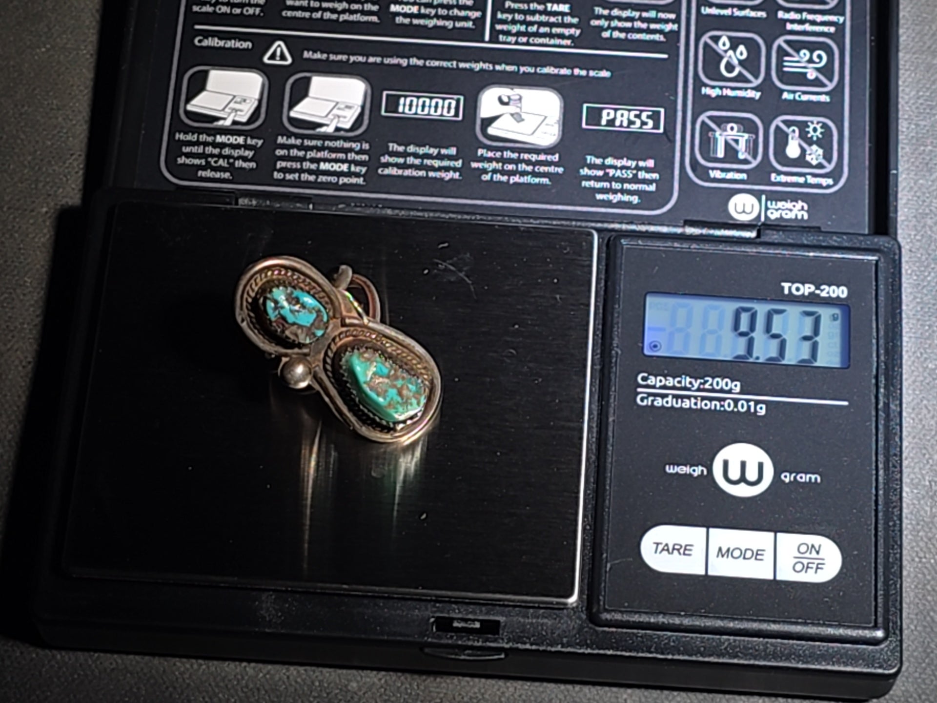 Vintage Old Pawn Native American Sterling Silver and Turquoise Two-Stone Ring with Sawtooth Bezels and Rope Wire Accents