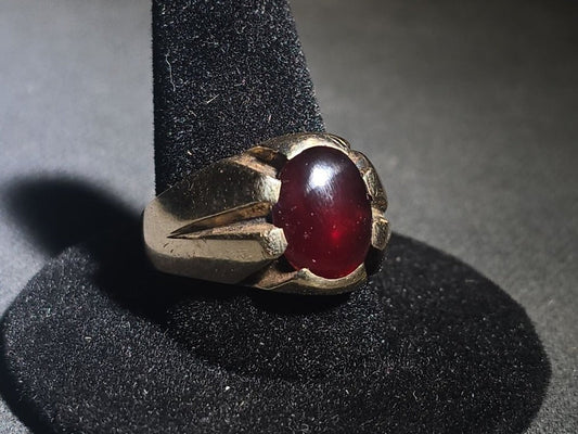 10K Gold Ring with Oval Cabochon Ruby and Angular Shoulders