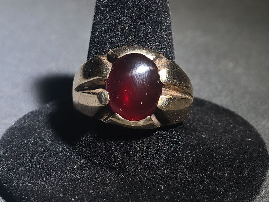 10K Gold Ring with Oval Cabochon Ruby and Angular Shoulders