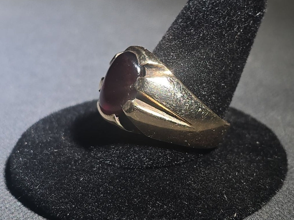 10K Gold Ring with Oval Cabochon Ruby and Angular Shoulders