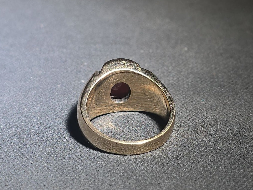 10K Gold Ring with Oval Cabochon Ruby and Angular Shoulders