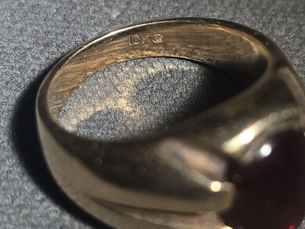 10K Gold Ring with Oval Cabochon Ruby and Angular Shoulders