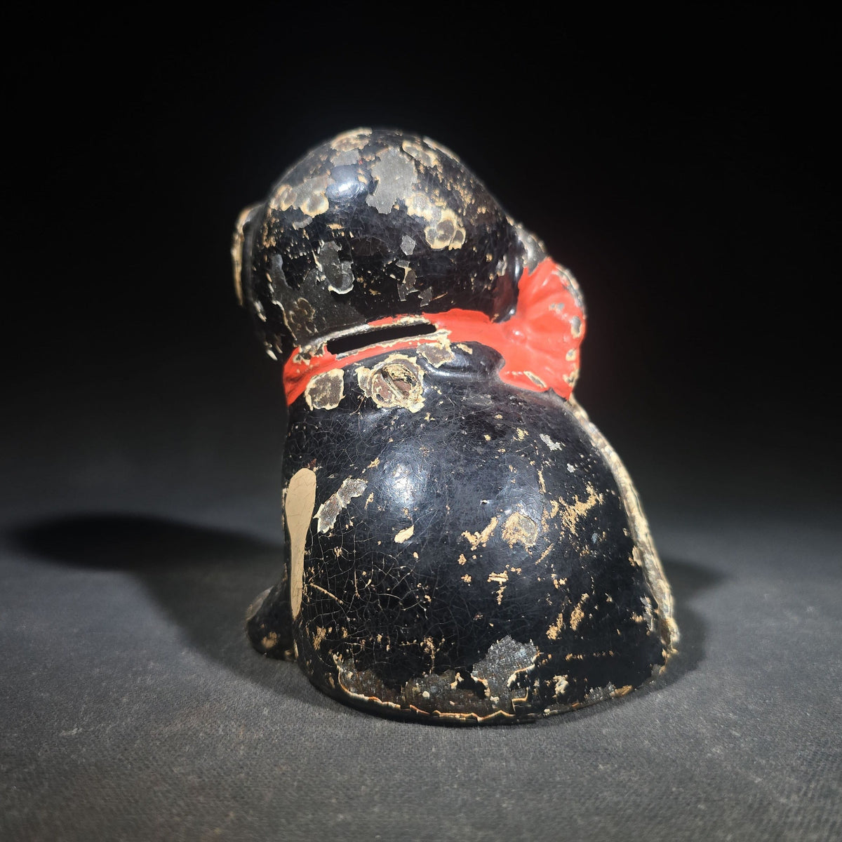 Vintage Hubley "Puppo" Painted Cast Iron Figural Puppy Still Bank with Red Bow