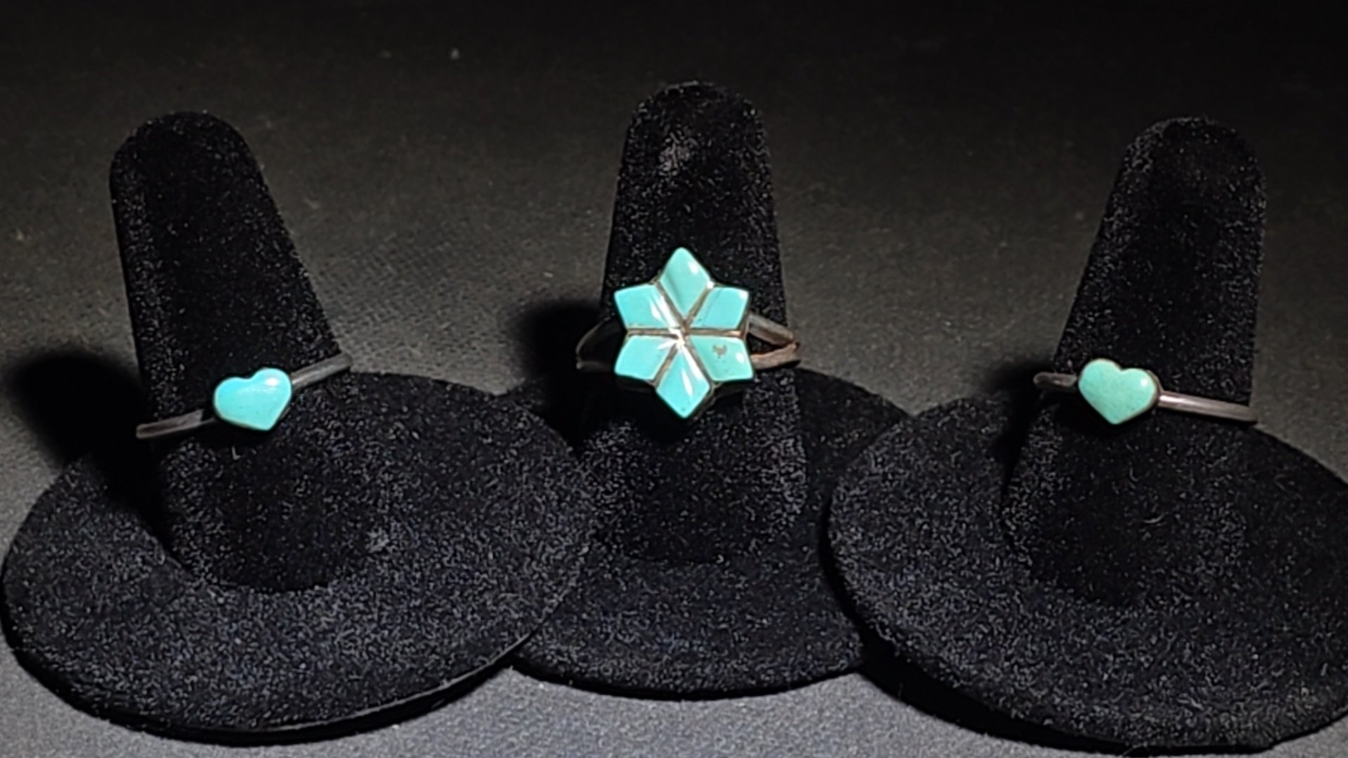 Trio of Vintage Southwestern Sterling Silver and Turquoise Rings Including Turquoise Inlay Star and Two Heart Cabochon Rings