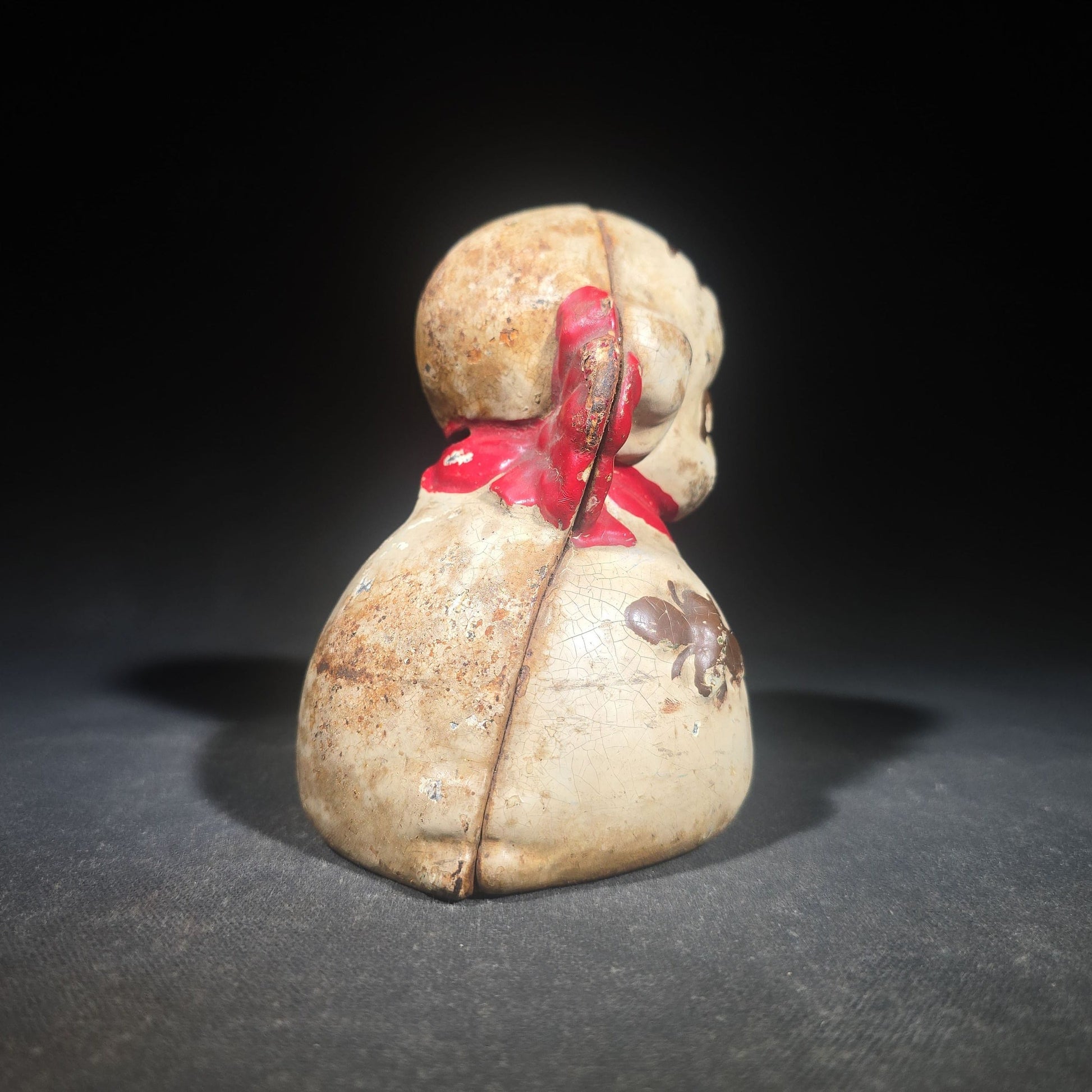 Vintage Hubley "Puppo" Painted Cast Iron Figural Puppy Still Bank with Red Bow and Bee Motif