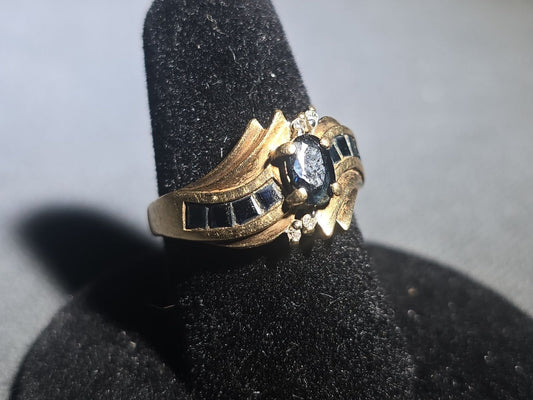 10K Gold Oval-Cut Sapphire and Diamond Bypass Ring with Channel-Set Sapphires