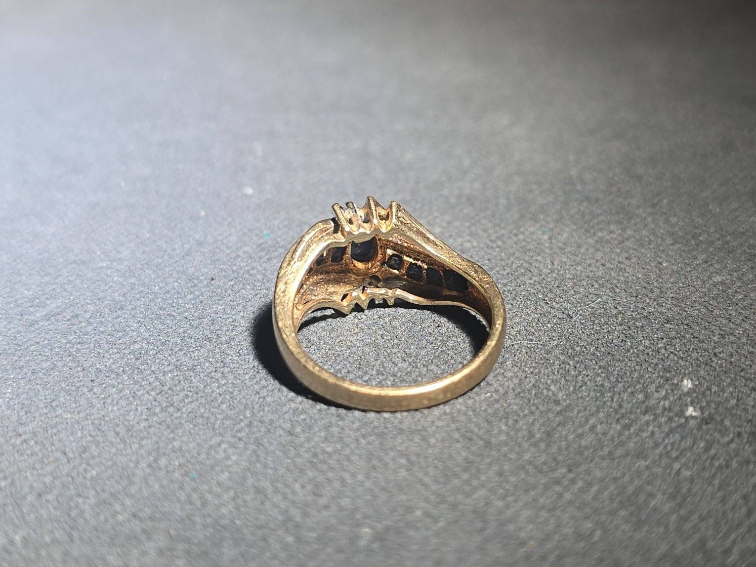 10K Gold Oval-Cut Sapphire and Diamond Bypass Ring with Channel-Set Sapphires