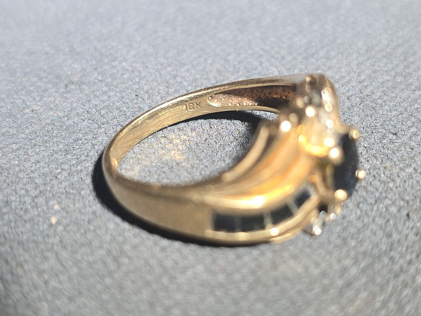 10K Gold Oval-Cut Sapphire and Diamond Bypass Ring with Channel-Set Sapphires
