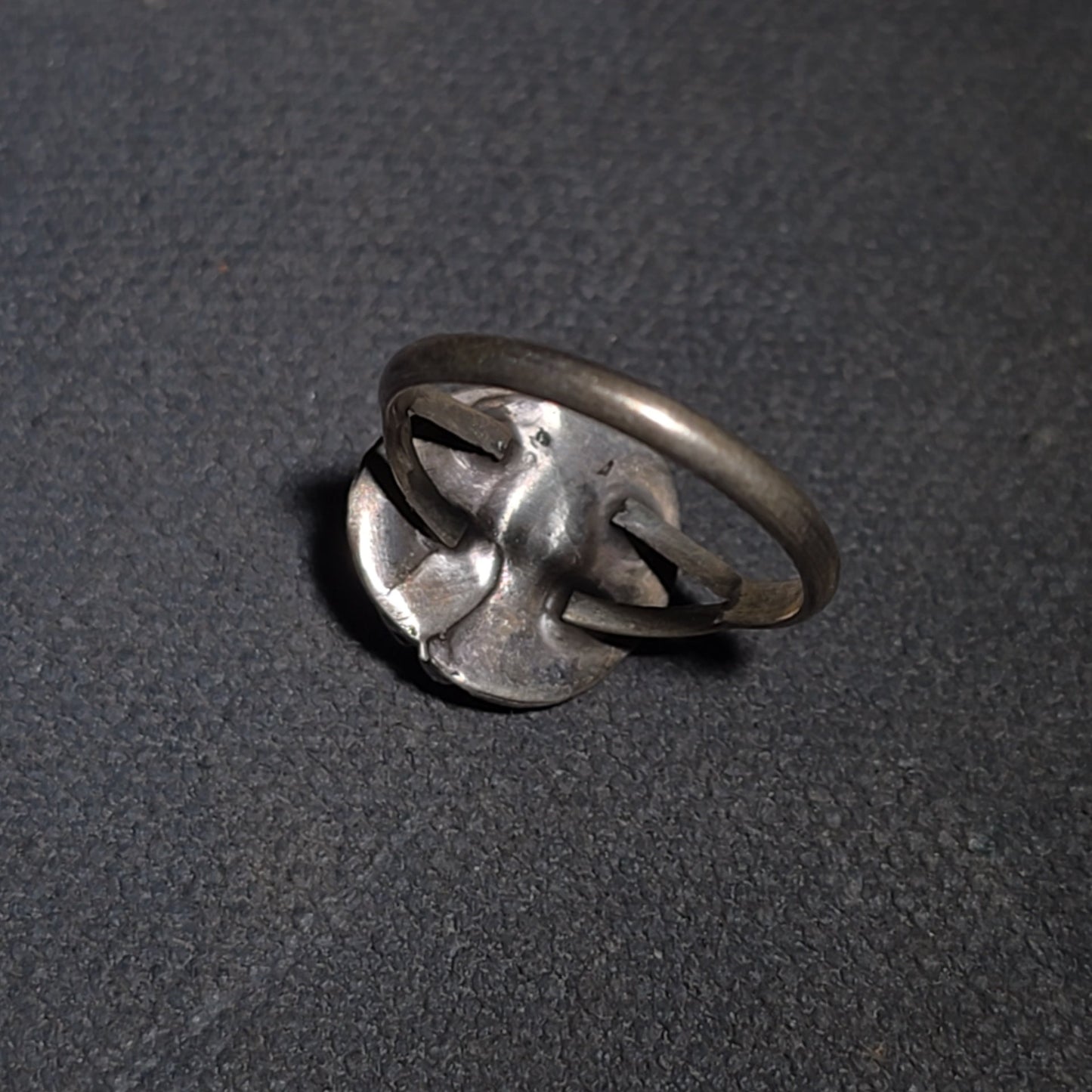 Grouping of Five Vintage Navajo Silver and Mother of Pearl Rings including a Four-Stone Ring by Les Hill, Sizes four through Seven
