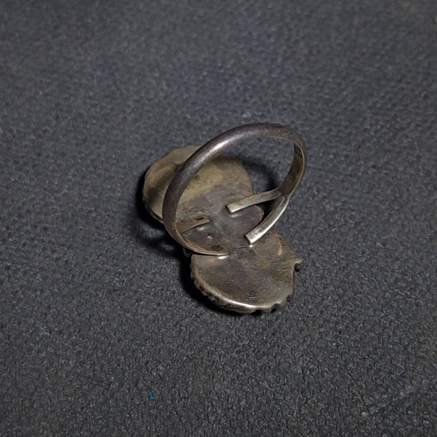Grouping of Five Vintage Navajo Silver and Mother of Pearl Rings including a Four-Stone Ring by Les Hill, Sizes four through Seven