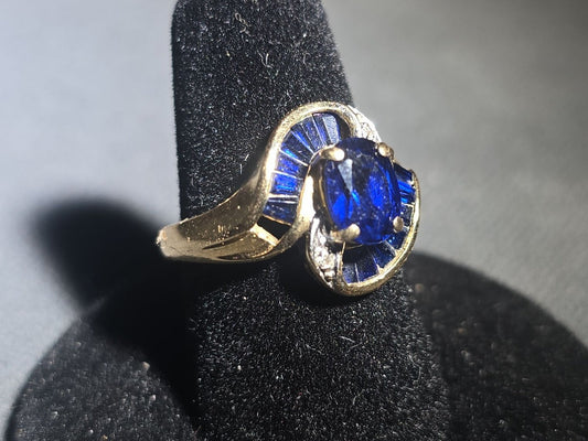 10K Gold Oval-Cut Sapphire and Diamond Bypass Ring with Baguette-Cut Sapphires