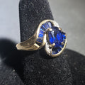 Lot 028 - 10k Gold Oval-Cut Sapphire and Diamond Bypass Ring with Baguette-Cut Sapphires, Size 6.5, Total Weight 3.49 g
