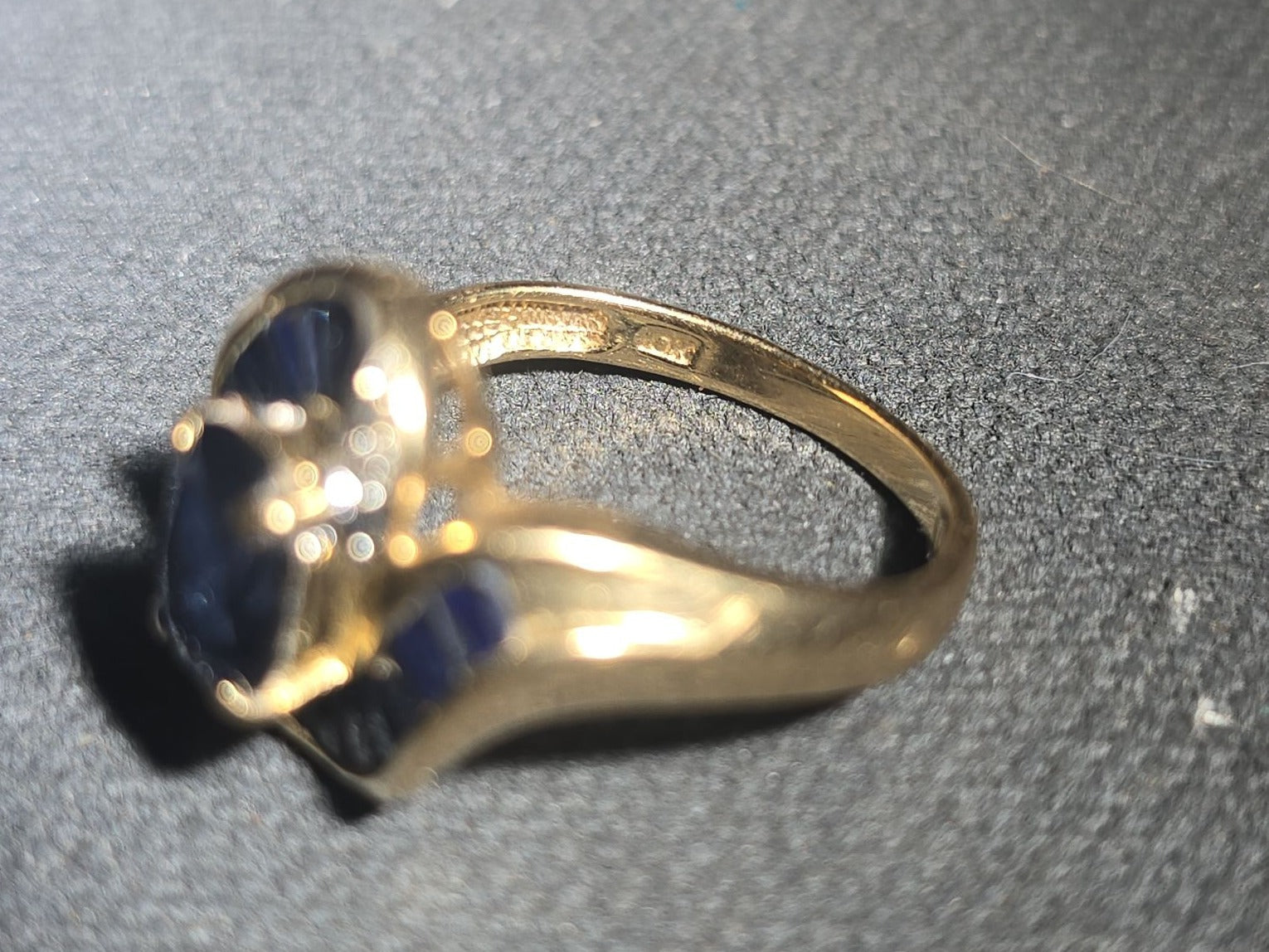 10K Gold Oval-Cut Sapphire and Diamond Bypass Ring with Baguette-Cut Sapphires