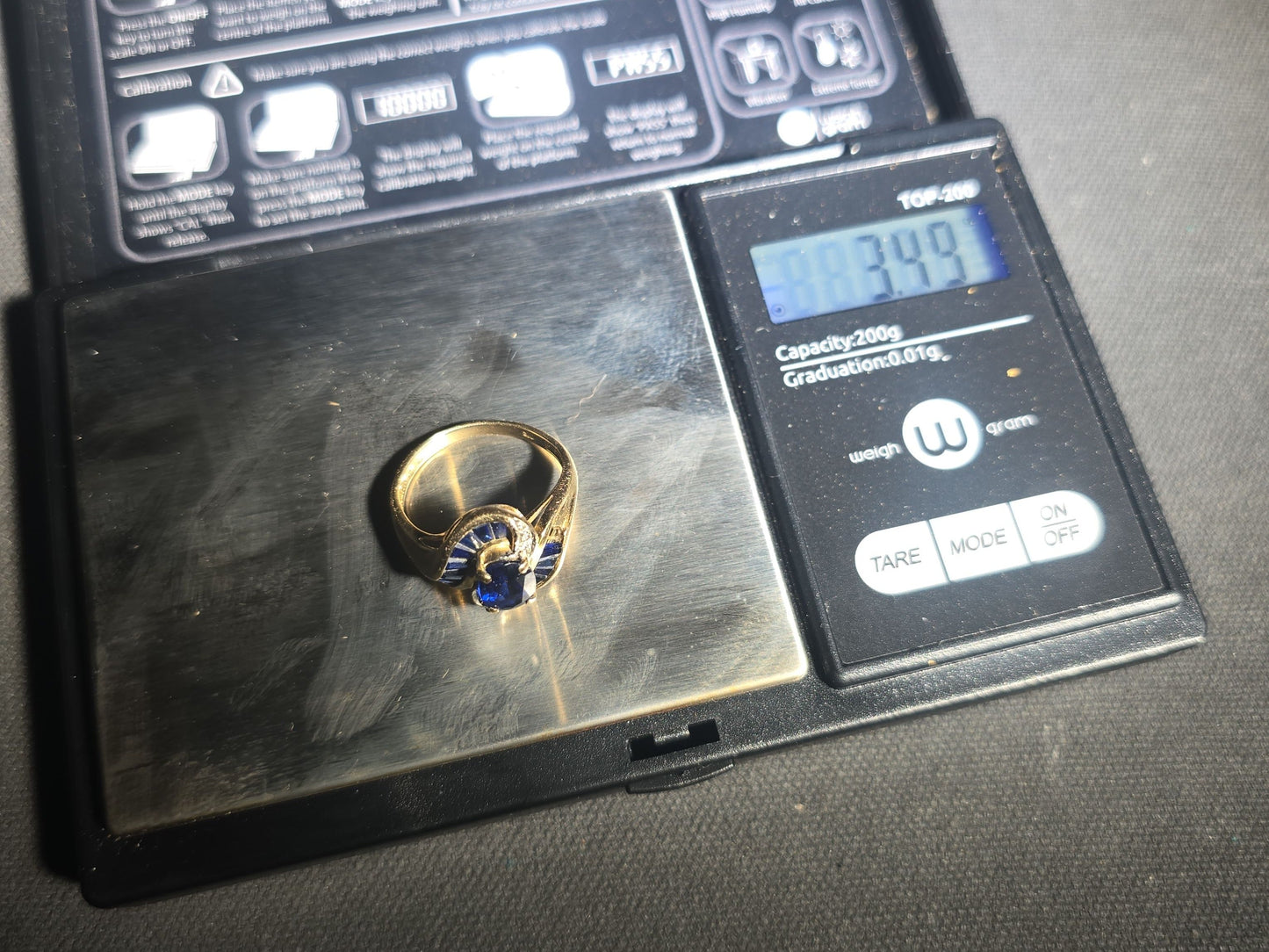 10K Gold Oval-Cut Sapphire and Diamond Bypass Ring with Baguette-Cut Sapphires