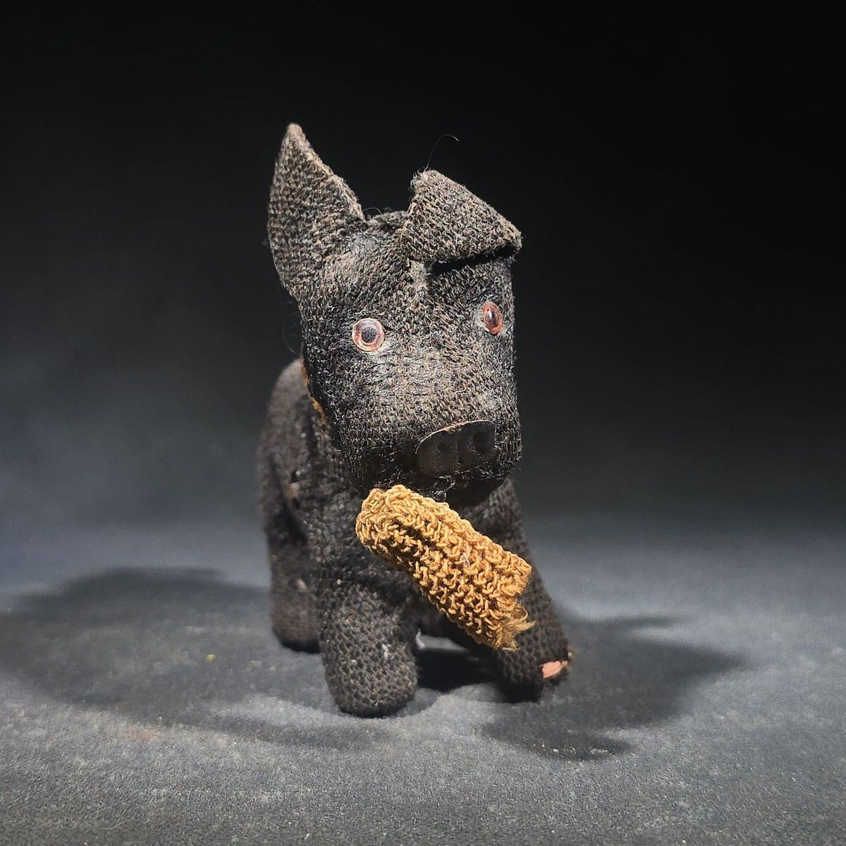 Antique Black Fabric-Covered Wind-Up Dog Toy with Glass Eyes, Crocheted Muzzle, Bell Collar, and Key