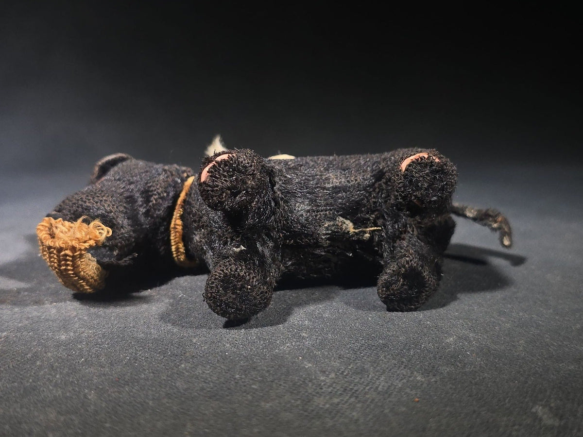 Antique Black Fabric-Covered Wind-Up Dog Toy with Glass Eyes, Crocheted Muzzle, Bell Collar, and Key