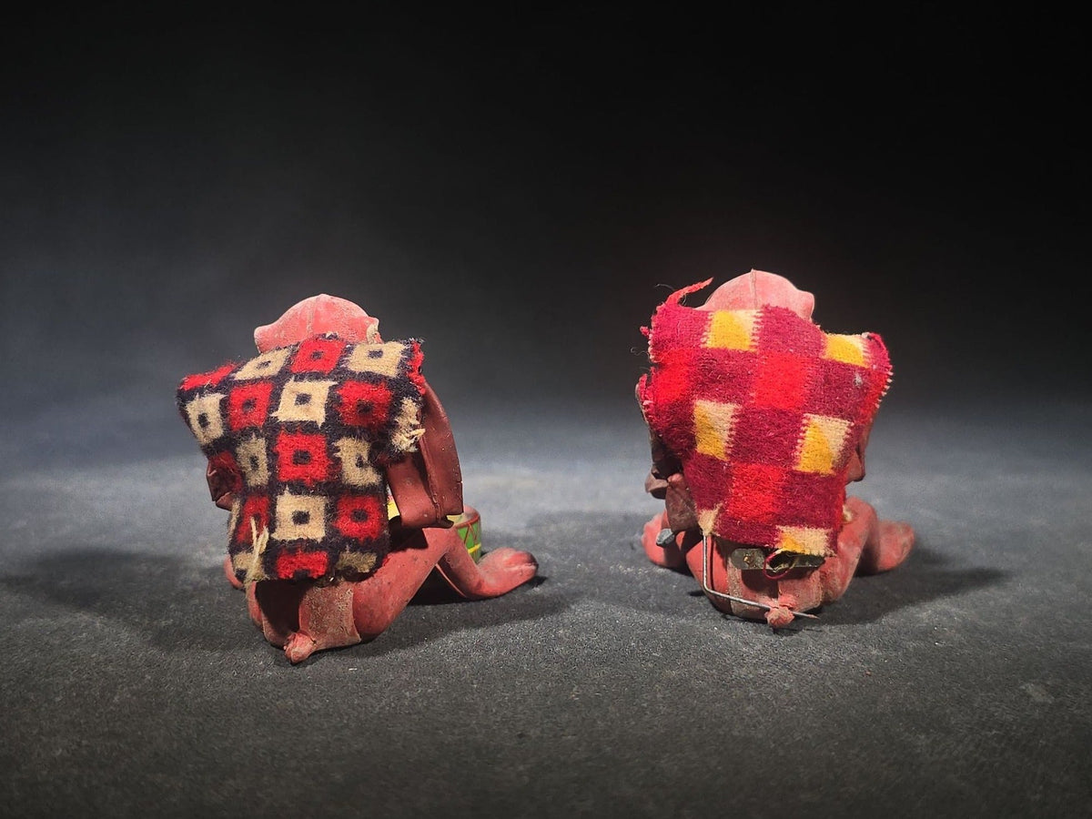 Pair of Vintage Rubber and Tin Lithograph Drumming Monkey Toys with Fabric Jackets, Note Missing Arm, Splits in Rubber