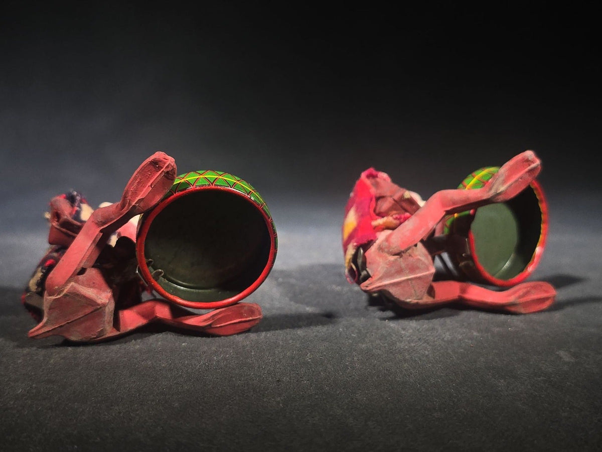 Pair of Vintage Rubber and Tin Lithograph Drumming Monkey Toys with Fabric Jackets, Note Missing Arm, Splits in Rubber