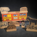 Lot 131 - Antique N.D.C. & Co. Wooden Circus Car No. 1909 Pull Toy with Paper Lithograph Graphics and Eight Wooden Animal Figures, Note Missing One Wheel, 9" L