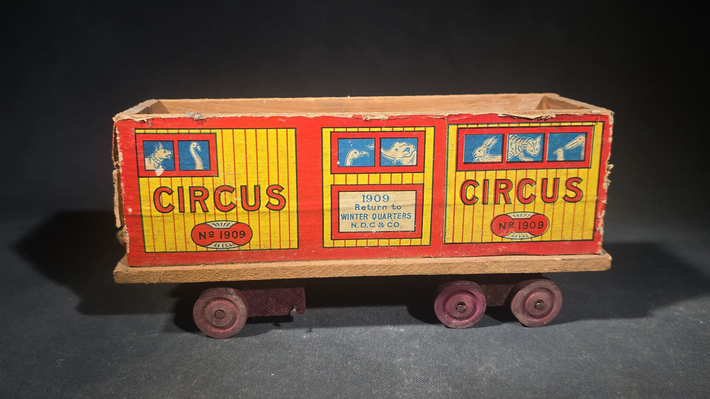 Antique N.D.C. & Co. Wooden Circus Car No. 1909 Pull Toy with Paper Lithograph Graphics and Eight Wooden Animal Figures, Note Missing One Wheel