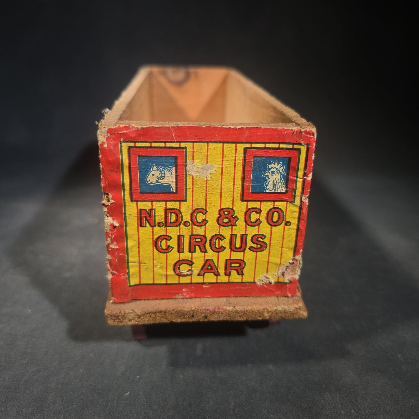 Antique N.D.C. & Co. Wooden Circus Car No. 1909 Pull Toy with Paper Lithograph Graphics and Eight Wooden Animal Figures, Note Missing One Wheel