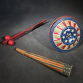Lot 141 - Trio of Antique Patriotic Noisemakers Including Tin Lithograph Noisemaker with Stars and Stripes, Paper Horn, and Red Wooden Ball Clapper
