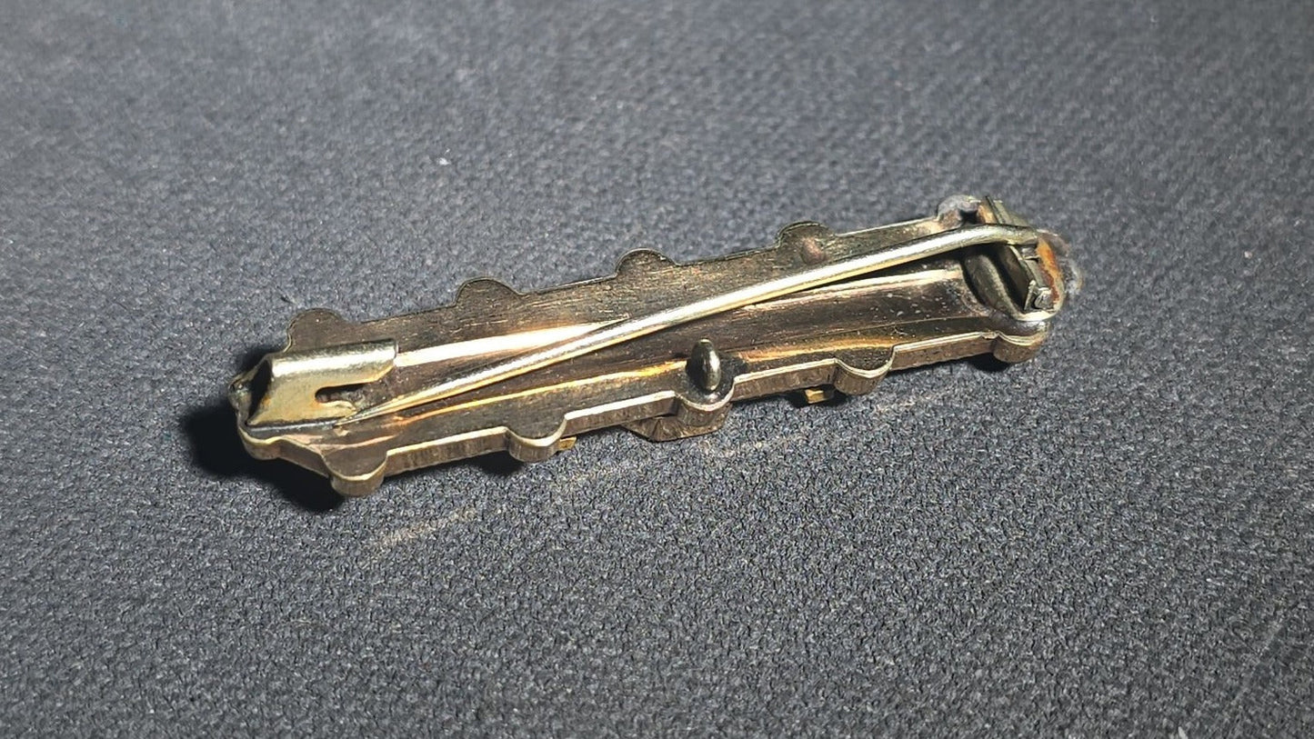 Antique Victorian Gold-Tone Bar Brooch with Black Enamel Center